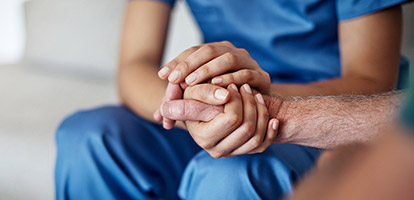 image of a nurse comforting a patient