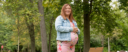 Grove City Hospital  patient Kayla Gregorish smiling at the camera outdoors.